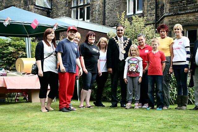 Leonard Cheshire Disability volunteers with Mayor Ali at the Honresfeld Cheshire Home in Littleborough