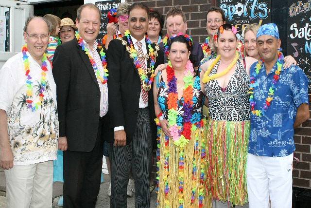 Councillor Keith Swift, MP Simon Danczuk, the Mayor of Rochdale, Councillor Zulfiqar Ali, organiser, Michael Cunningham, Councillor Andy Kelly and guests at the Milnrow Workmen's Club charity beach party