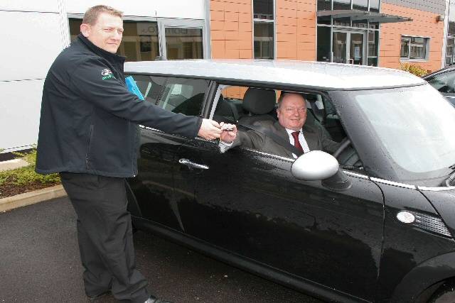 Rochdale Borough Council executive director John Patterson gets passed the keys to efficient driving by a DriveSense instructor

 
