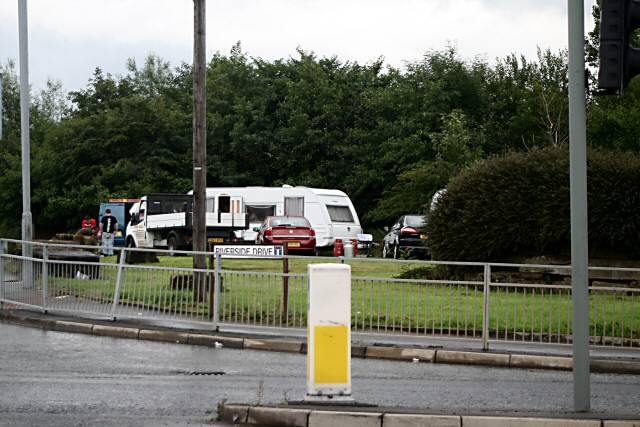 The convoy of caravans at the junction of Albert Royds Street and Riverside Drive