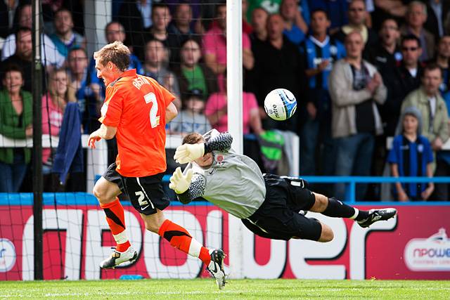 Rochdale 0 - 0 Hartlepool<br />
Hartlepool keeper Scott Flinders saves from a Akpa-Akpro shot