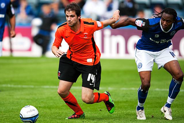 Rochdale 0 - 0 Hartlepool<br />
Jean Louis Akpa-Akpro chases Hartlepool's James Brown