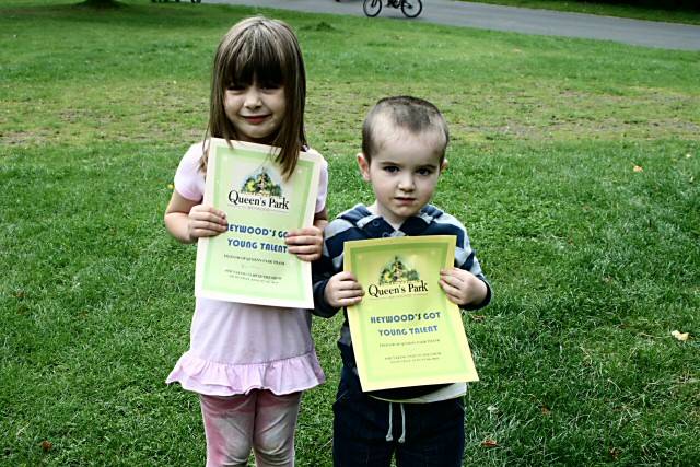 Quintana and Scott Smith with their certificates