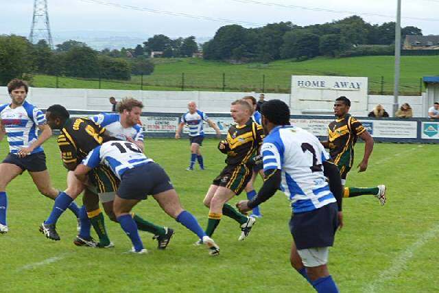 Rochdale Mayfield and Rochdale Cobras battle it out in the Charity Cup final