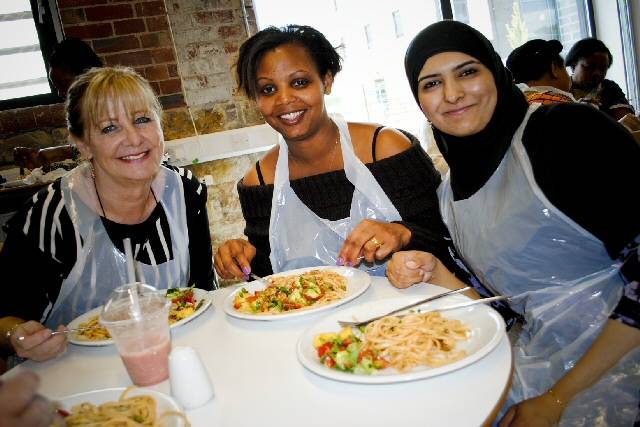 Maggie Howlett, Bella Katusima and Aiysha Rameem enjoying the food they made at the class