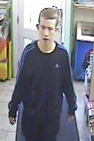 A CCTV image of a man the police want to speak to in connection with the robbery