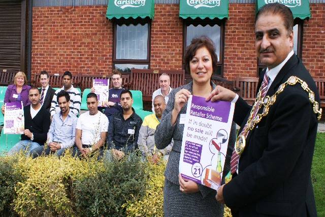 Lucia Renshaw, Principal Trading Standards Officer at Rochdale Borough Council and Rochdale Mayor, Zulfiqar Ali welcome responsible retailers to their training at Rochdale Cricket Lacrosse & Squash Club