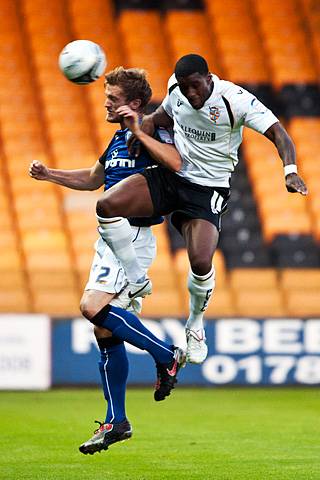 Port Vale 2 - 1 Rochdale<br />Scott Wiseman beats Anthony Griffiths in the air