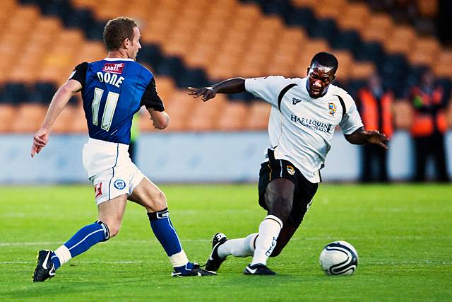 Port Vale 2 - 1 Rochdale<br />Matthew Done shows too much of the ball to Anthony Griffith