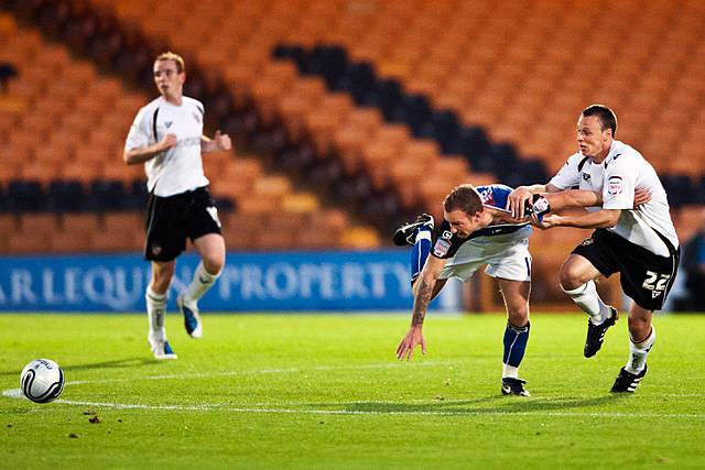 Port Vale 2 - 1 Rochdale<br />Gary Roberts tries to take the shirt off Matthew Done's back!