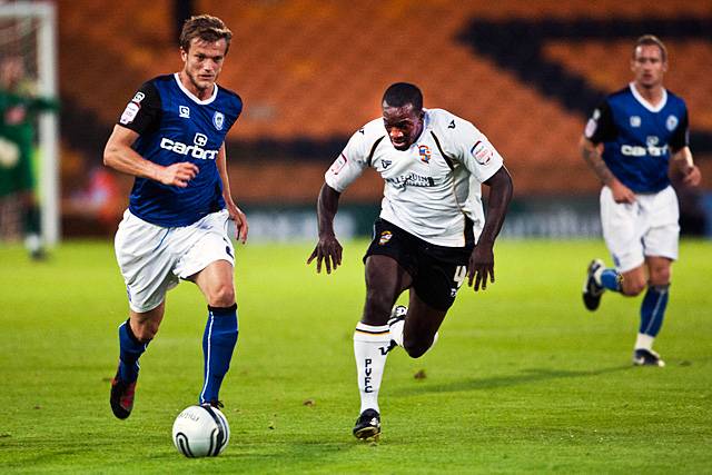 Port Vale 2 - 1 Rochdale<br />Scott Wiseman with Anthony Griffiths chasing