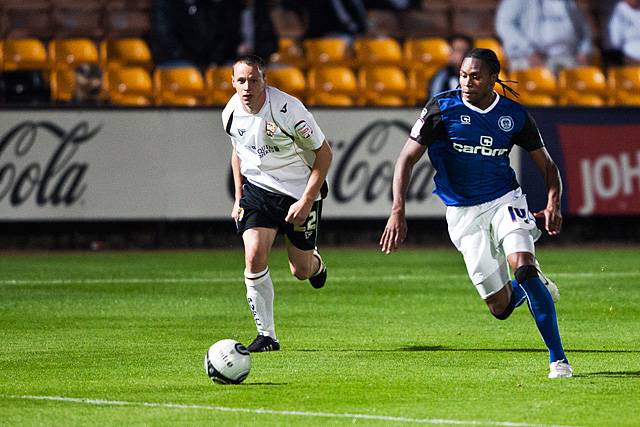 Port Vale 2 - 1 Rochdale<br />Jean Louis Akpa-Akpro with Gary Roberts chasing