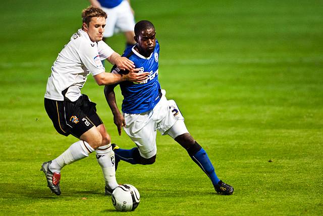 Port Vale 2 - 1 Rochdale<br />Adam Yates holds Helio Andre back