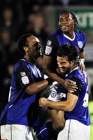 Rochdale 3 - 0 Huddersfield<br>Jean-Louis Akpa Akpro, Brian Barry-Murphy and Chris O'Grady celebrate Akpro's goal