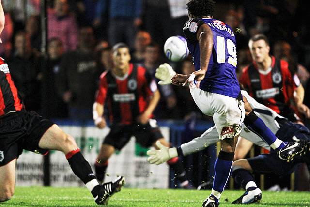 Rochdale 3 - 0 Huddersfield<br>Chris O'Grady fires Dale's third into the roof of the net