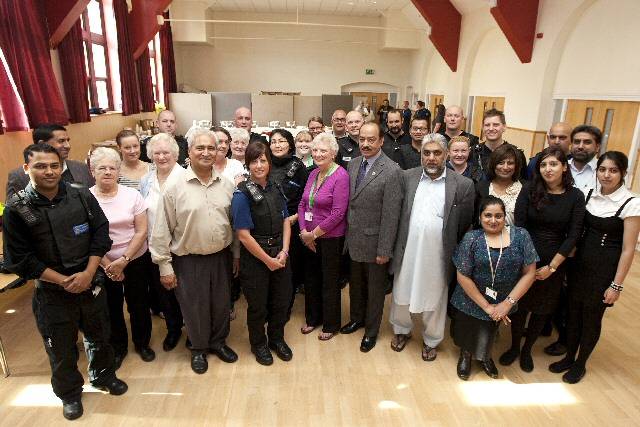 Members of the police with members of the community