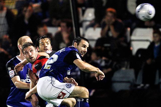 Rochdale 3 - 0 Huddersfield<br>Alan Goodall wins the aerial battle against Damian Johnson