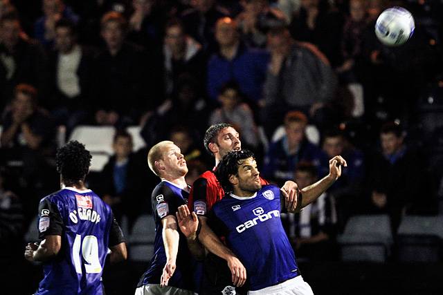 Rochdale 3 - 0 Huddersfield<br>Brian Barry-Murphy and Jason Kennedy 'sandwich' Jamie McCombe