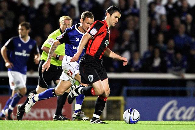 Rochdale 3 - 0 Huddersfield<br>Matthew Done chases Damian Johnson