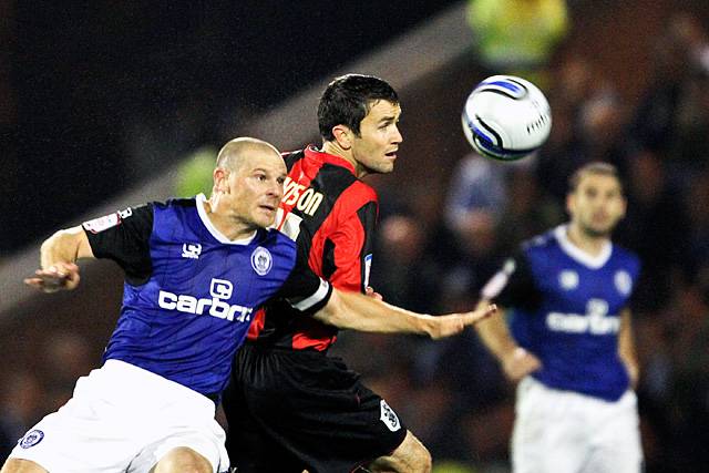 Rochdale 3 - 0 Huddersfield<br>Gary Jones and Damian Johnson compete in midfield