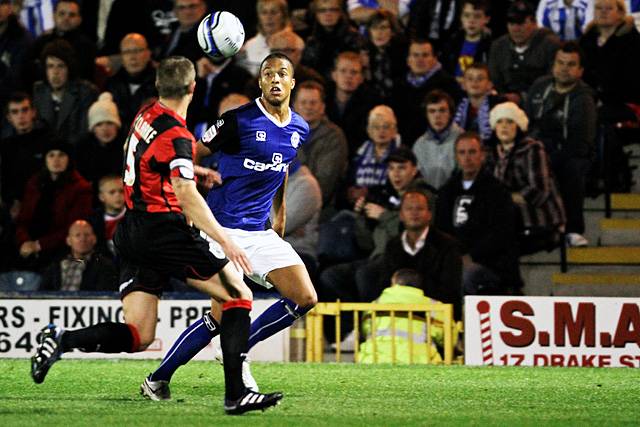 Rochdale 3 - 0 Huddersfield<br>Peter Clarke and Joe Thompson watch the ball