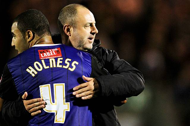 Dale manager Keith Hill congratulates Marcus Holness after a game 