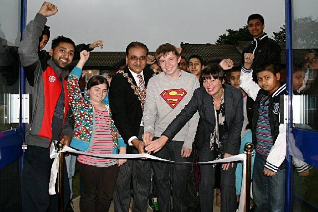 The Mayor of Rochdale, Councillor Zulfiqar Ali and Executive Director for Children’s Services, Cheryl Eastwood join excited youths as doors to the new youth centre opens