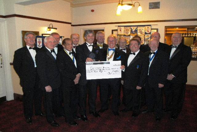 Heywood Rotarians presenting a cheque for Springhill Hospice