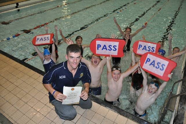 Matthew Di Rosa with some of the young swimmers that he coaches