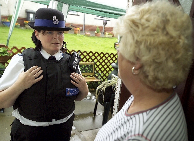 A vulnerable resident receiving crime prevention advice