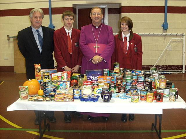 Bishop Mark with headmaster Kevin Sartain and Head Boy - Jackson Cowie and Head Girl - Jessica Timperley
