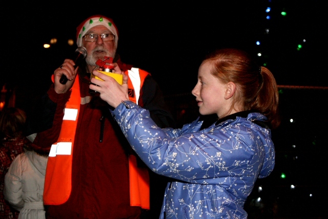 Jessica Frater pressing the button for the lights alongside LEAF Chairman Steve Lister