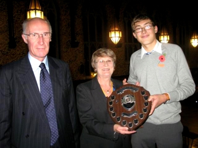 David Smithard and Joan Banks from the Rotary Club of Rochdale presenting Alex Johnston with the Rotary Shield