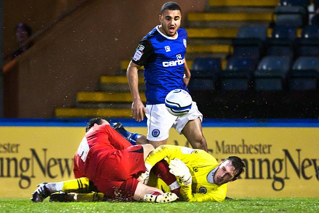 Rochdale 1 - 1 Leyton Orient<br \>Dale keeper Josh Lillis handles a back pass under pressure from Scott McGleish