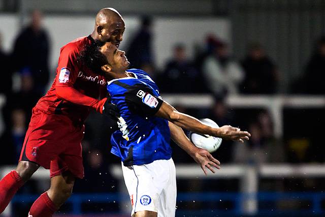 Rochdale 1 - 1 Leyton Orient<br \>Chris O'Grady gets a push in the back from Terrell Forbes