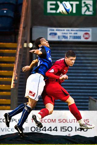 Rochdale 1 - 1 Leyton Orient<br \> Joe Widdowson and Alex Revell battle in the air