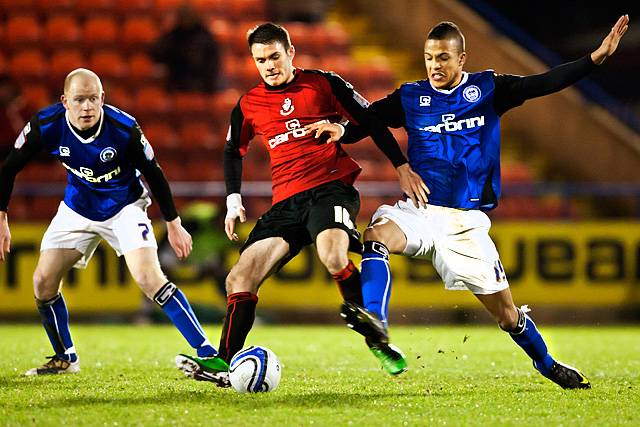 Rochdale 0 - 0 Bournemouth<br \>Joe Thompson tackles Rhoys Wiggins