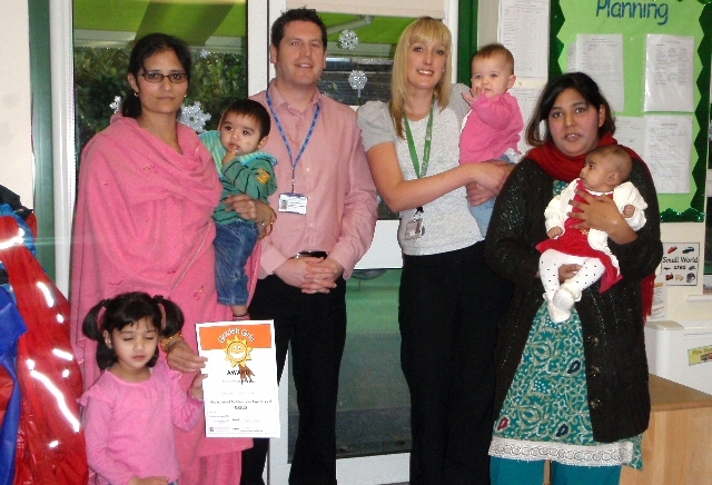 Parent Mumtaz Yousaf with Khadija Yousaf & Mohammed Eisa, Andrew Forrest Oral health Promotion manager, Paula Marshall Early Years Co-ordinator with Imogen Belfield and Shazia Parveen with Liaba Arshad

