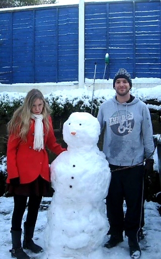 Sophie Cronin and Jon Pudny with their snowman in Shawclough