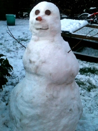 Six-year-old Aleesha Long from Heywood has built a snowman called Snowflake