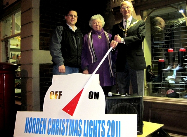 The Deputy Mayor and Mayoress of Rochdale and NEEVA Chairman, Peter Winkler turning on the Christmas lights