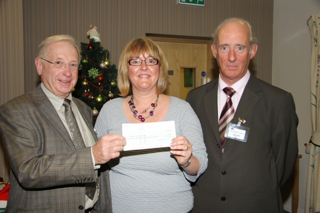 Cheque presentation : Peter Hewitt, District Chairman, Rochdale Freemasons, Julie Halliwell, Springhill Hospice  and Alan Barlow, Deputy Chairman, Rochdale Freemasons 