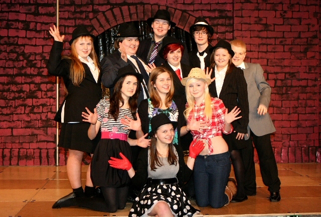 Some of the Guys and Dolls cast in dress rehearsals