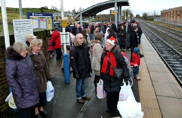 People waiting for the Mince Pie Special train at Littleborough