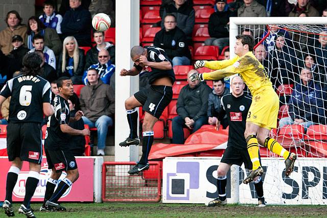 Walsall 0 - 0 Rochdale<br \>Owain Fon Williams punches as Marcus Holness ducks out of the way