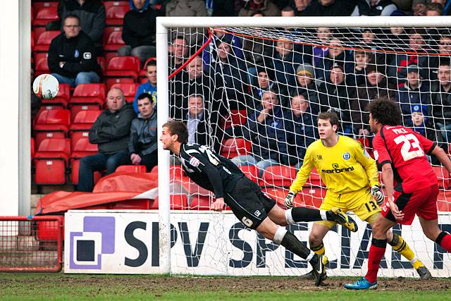 Walsall 0 - 0 Rochdale<br \>Craig Dawson clears with a diving header
