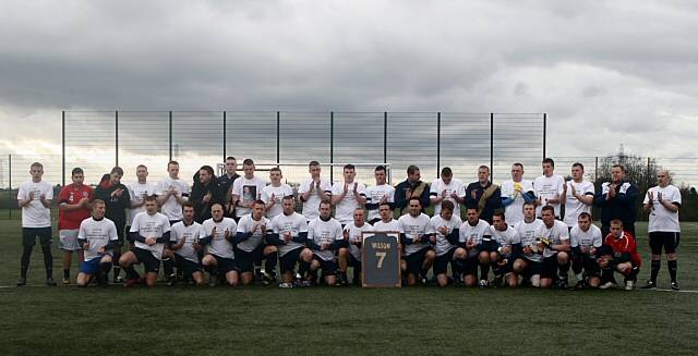 The players clapped for two minutes before the match began. They had Danny's framed shirt with them.