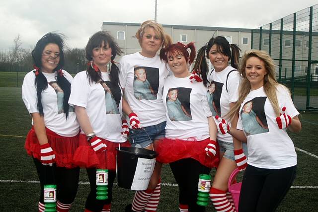 Friends armed with their fundraising tins and buckets to raise money for the Wilson family