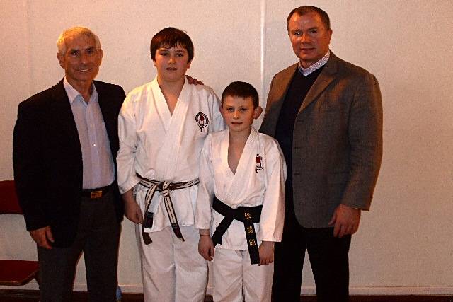 Aston Buckley (left) was awarded a black belt grading.  He is the youngest member of the Rossendale Shotokan Karate Club to achieve a black belt in its 25 year history.