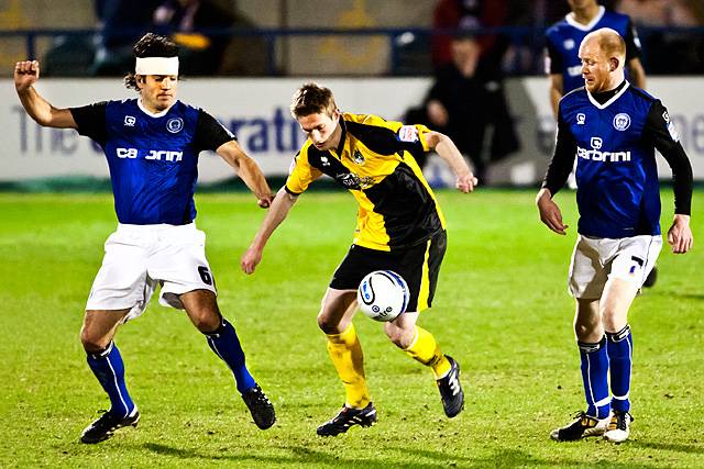 Rochdale 3 - 1 Bristol Rovers<br />Cian Bolger is challenged by Brian Barry-Murphy as Jason Kennedy looks on